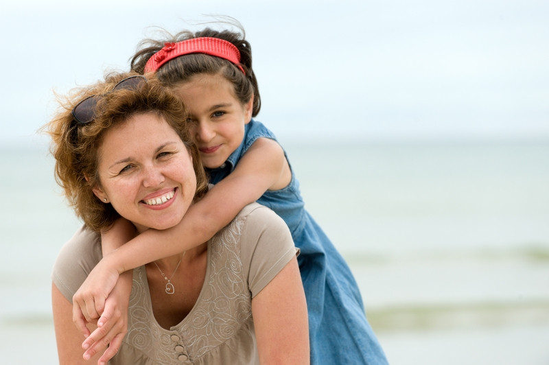 daughter hugging mom